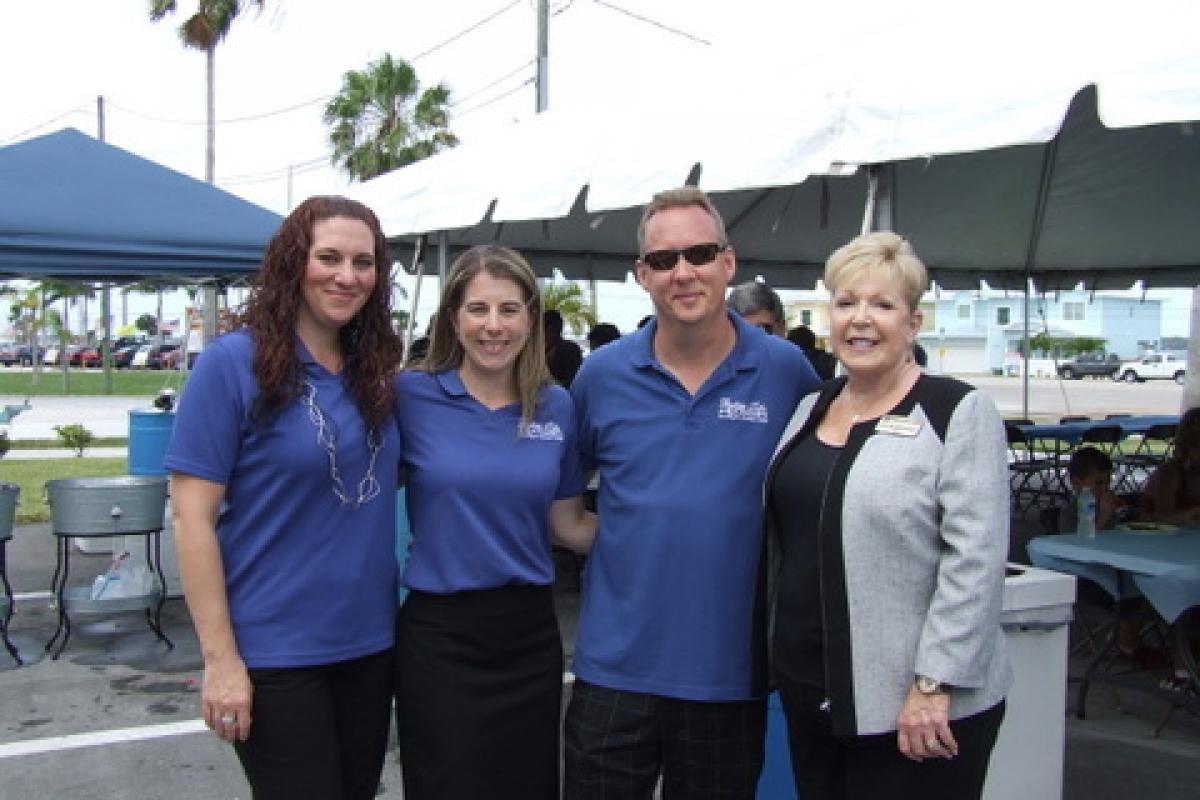 (LtoR) Tonya Bader, Tiffany & Shawn Fortenberry Co-Owners, Mayor McCormack